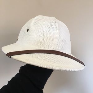 Adjustable white pith helmet